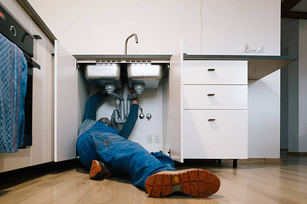 Professional Drain Cleaning technician working in Millsboro, DE